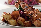 Roasted potatoes and turkey kabobs