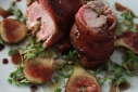 bacon wrapped pork tenderloin stuffed with figs and blue cheese